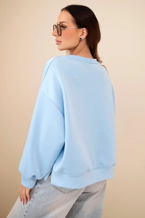 Bluza damska masełkowa z haftem o luźnym kroju niebieska
