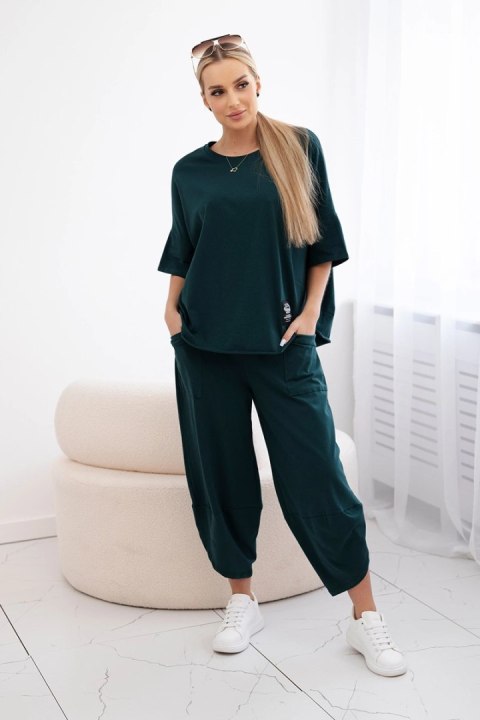 Ciemnozielony komplet bawełniany bluzka i spodnie – elegancja w kolorze butelkowej zieleni