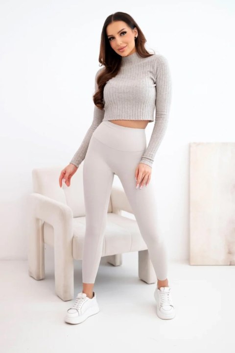 Beżowe legginsy damskie z wysokim stanem i szerokim elastycznym pasem modelującym