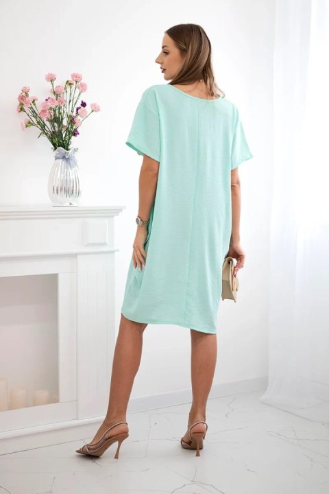 Sukienka z kieszeniami i wisiorkiem jasno miętowa