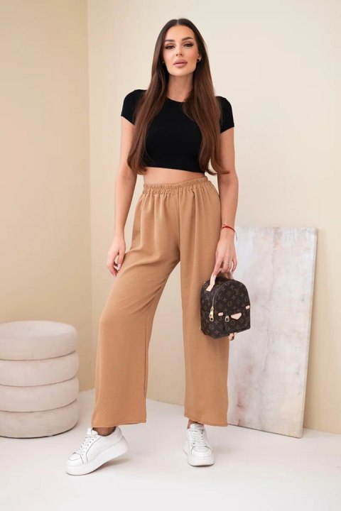 Eleganckie camelowe spodnie damskie z szeroką nogawką typu Wide Leg