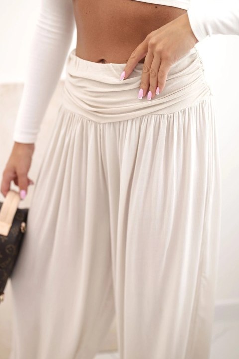 Spodnie damskie wiskozowe z szeroką nogawką i marszczeniami beżowe