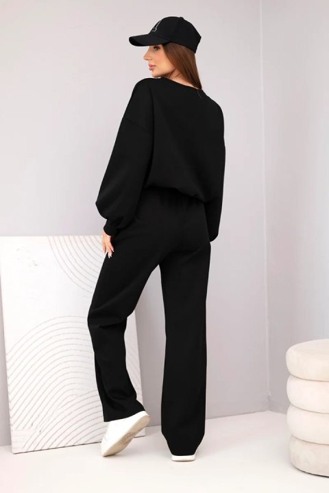 Komplet damski masełko bluza z broszką i spodnie z prostą nogawką czarny
