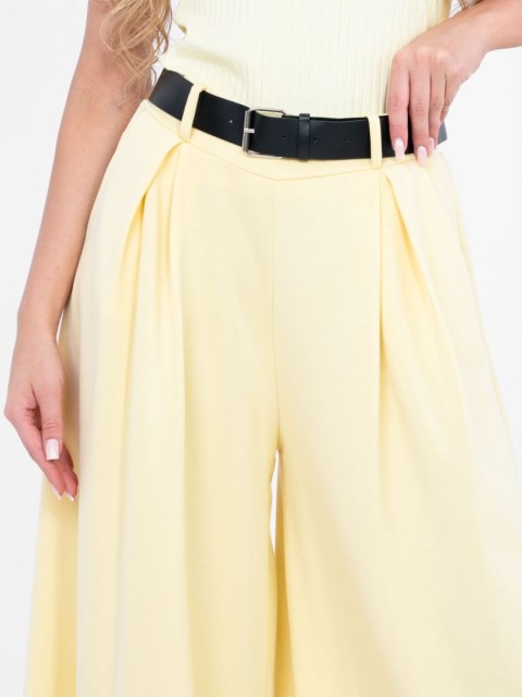 Damskie spodnie masełkowe z szeroką nogawką żółte