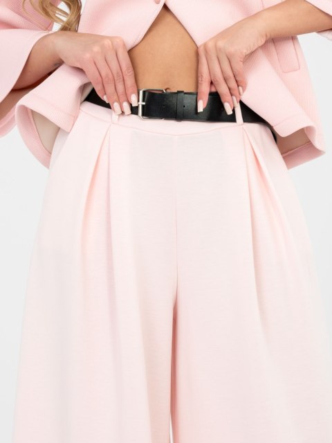 Damskie spodnie masełkowe z szeroką nogawką jasno różowe