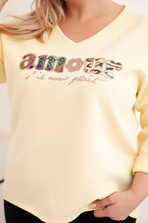 Bluza damska Plus Size z napisem i dekoltem V żółta