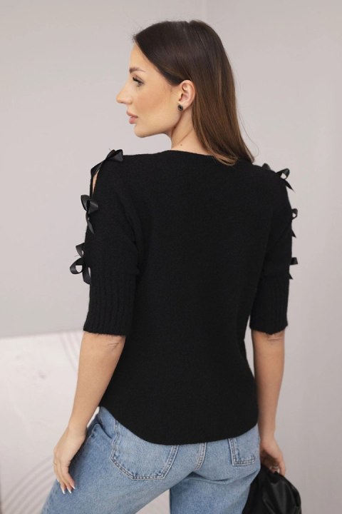 Czarny sweter damski z krótkim rękawem i ozdobnymi kokardkami