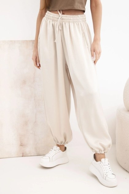 Spodnie damskie szerokie z gumką w pasie i wiązaniem typu alladynki beżowe