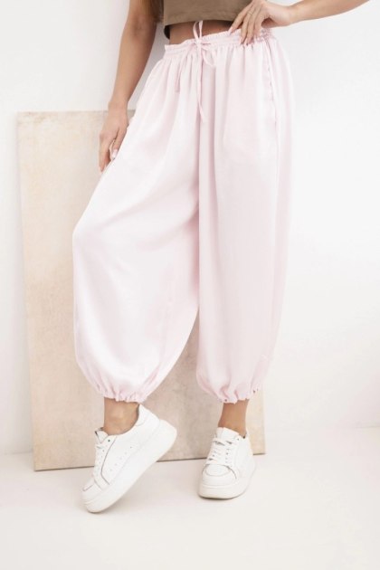 Spodnie damskie szerokie z gumką w pasie i wiązaniem typu alladynki cukierkowy róż