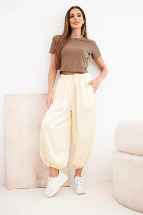 Spodnie damskie szerokie z gumką w pasie i wiązaniem typu alladynki żółte