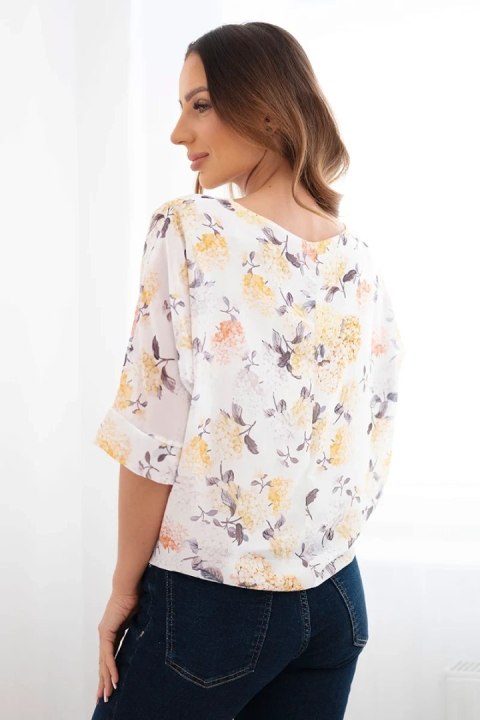 Bluzka damska w kwiaty z wiązaniem na dole żółta