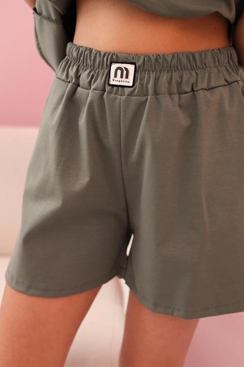 Komplet damski z falbanką - bluzka z krótkim rękawem i szorty z gumką khaki