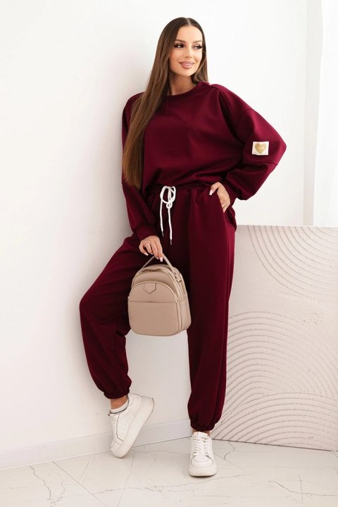 Komplet damski masełkowy z luźną bluzą i spodniami z napisem LOVE śliwkowy