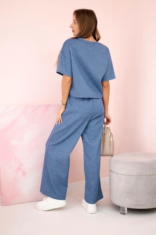 Komplet masełko bluzka z kwiatem + spodnie jeansowy melanż
