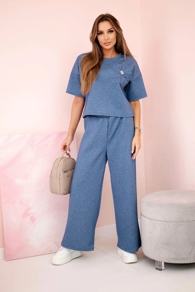 Komplet masełko bluzka z kwiatem + spodnie jeansowy melanż