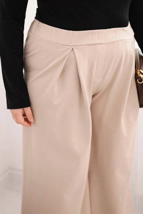 Spodnie damskie Plus Size z szerokimi nogawkami i plisowaniem beżowe